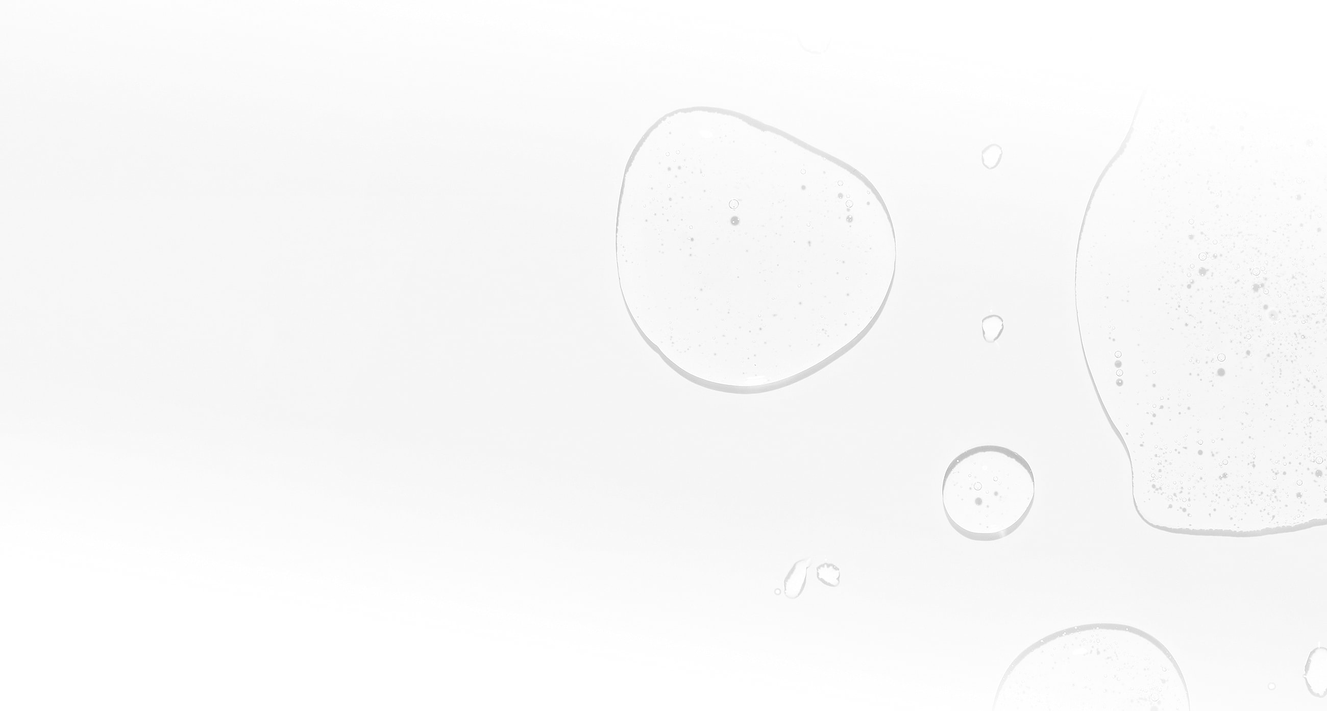Translucent bubbles on a white background.