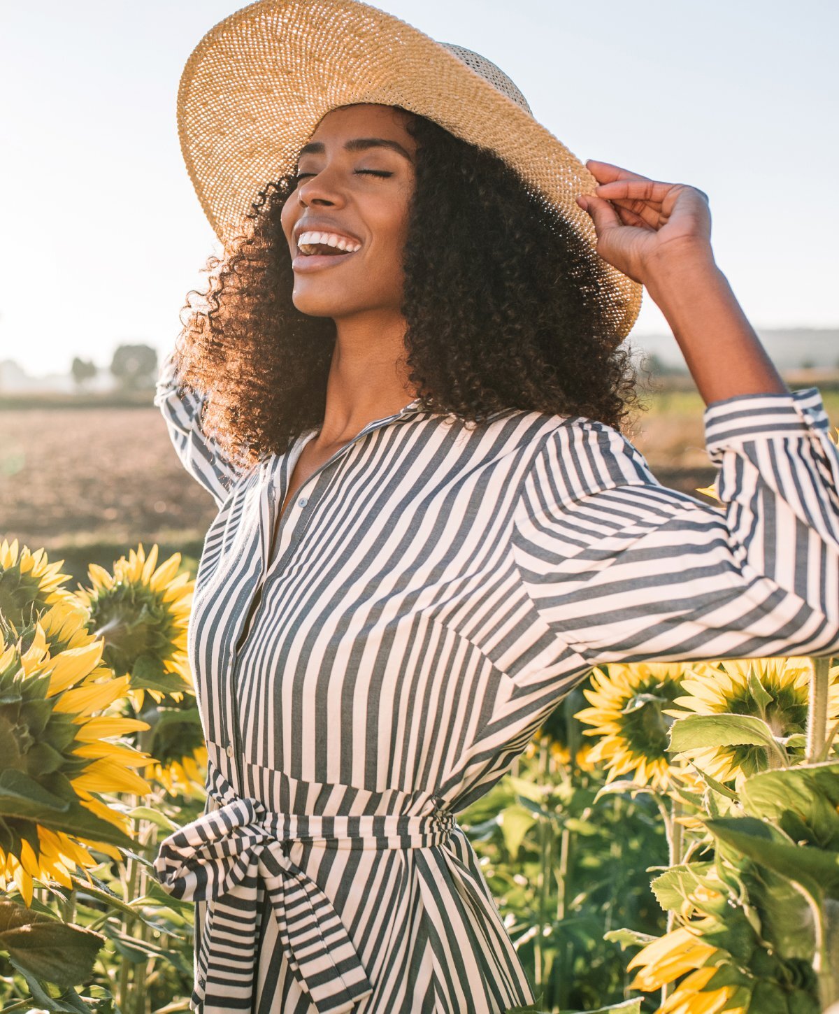Colorado Springs DiamondGlow model with curly hair